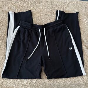 Sports Illustrated size medium Black Track Pants with White Side Stripe